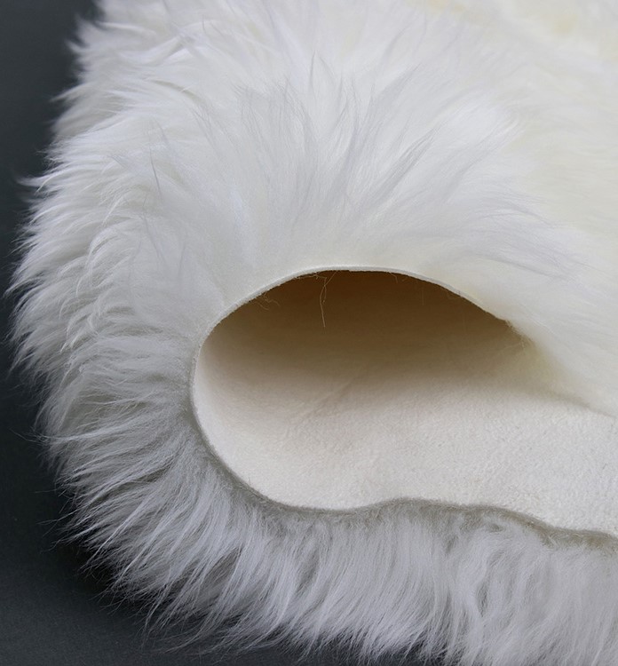Lammfelle gefertigt aus zwei halben Fellen (Kopfstücke) - naturweiß 